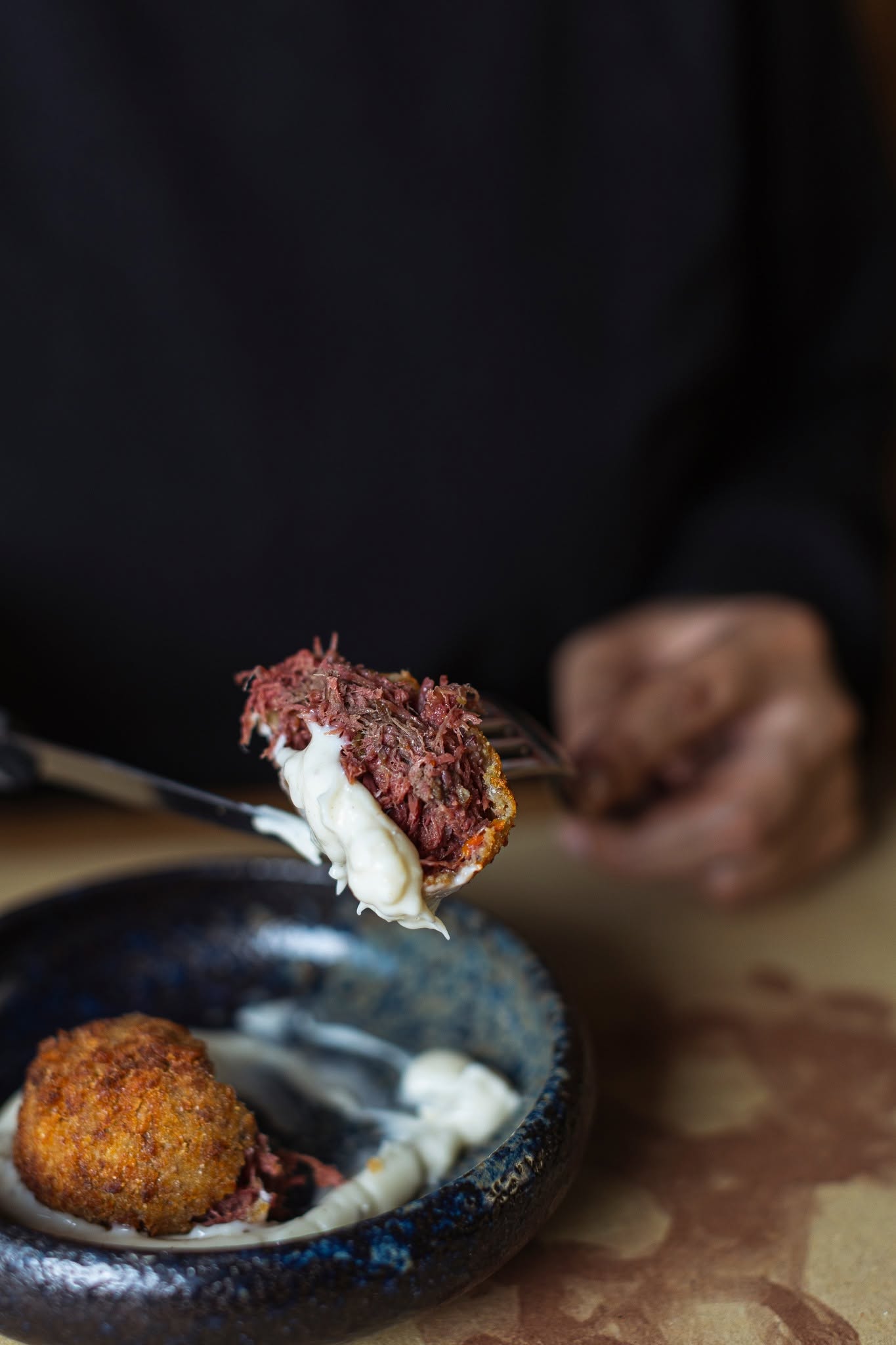 Interno del trunzu fritto sulla crema